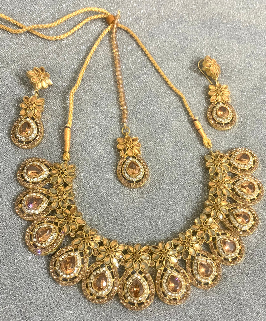 Golden Exquisite Jewellery set (3 piece) Necklace, Earrings and Tika